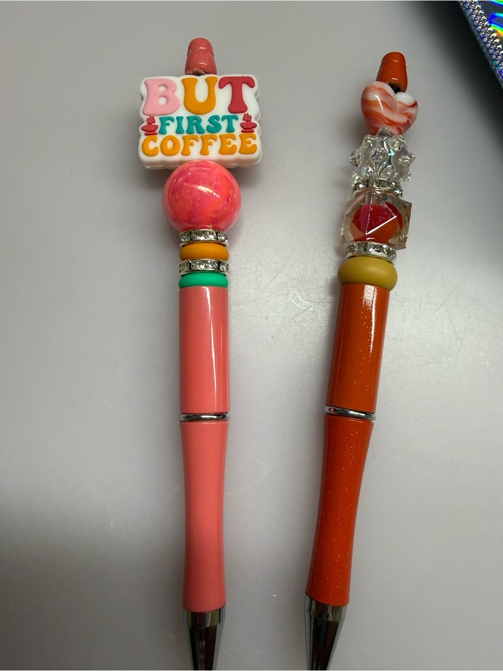 Beaded pens, set of 2. Coral and orange coffee and heart focal beads
